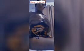 Naija Girl Oiling Her Succulent Boobs