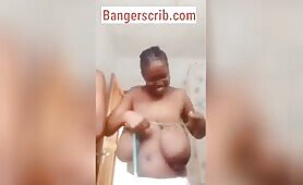 What’s This Ugandan Lady Doing To Her Boobs