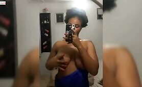 Eunice shows off her breasts in new video