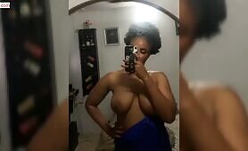 Eunice shows off her breasts in new video