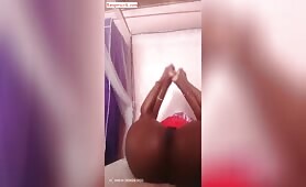 Judy Njoki massages herself 