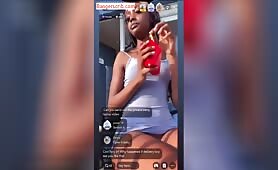 Ebony Bitch “Tsunamii xo” In Mini Gown On Live Stream Displaying Her Pussy To The Camera Outdoor